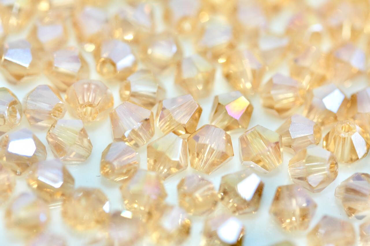 Намистина Біконус Lt. Topaz AB